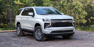 A white 2025 Chevrolet Tahoe parked outdoors in a wooded area near Wind Gap, Pennsylvania